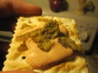Comback sauce on a cracker with jalapeno chips.JPG