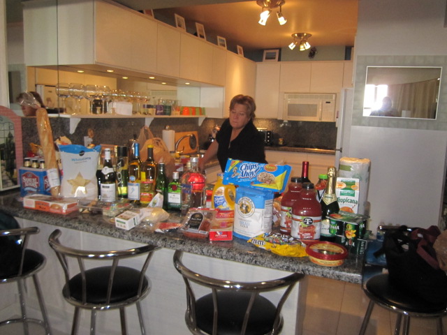 1 First shopping booty, Lynne with groceries.JPG