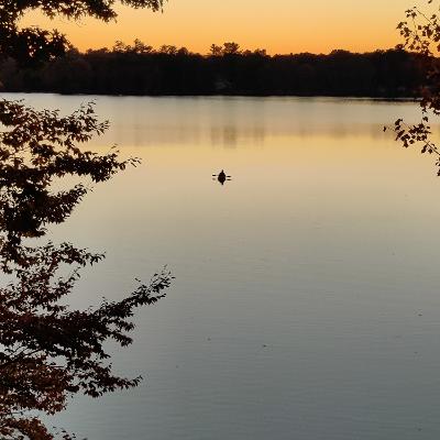 Canoer on Jan and Ann's pond, sunset.jpeg