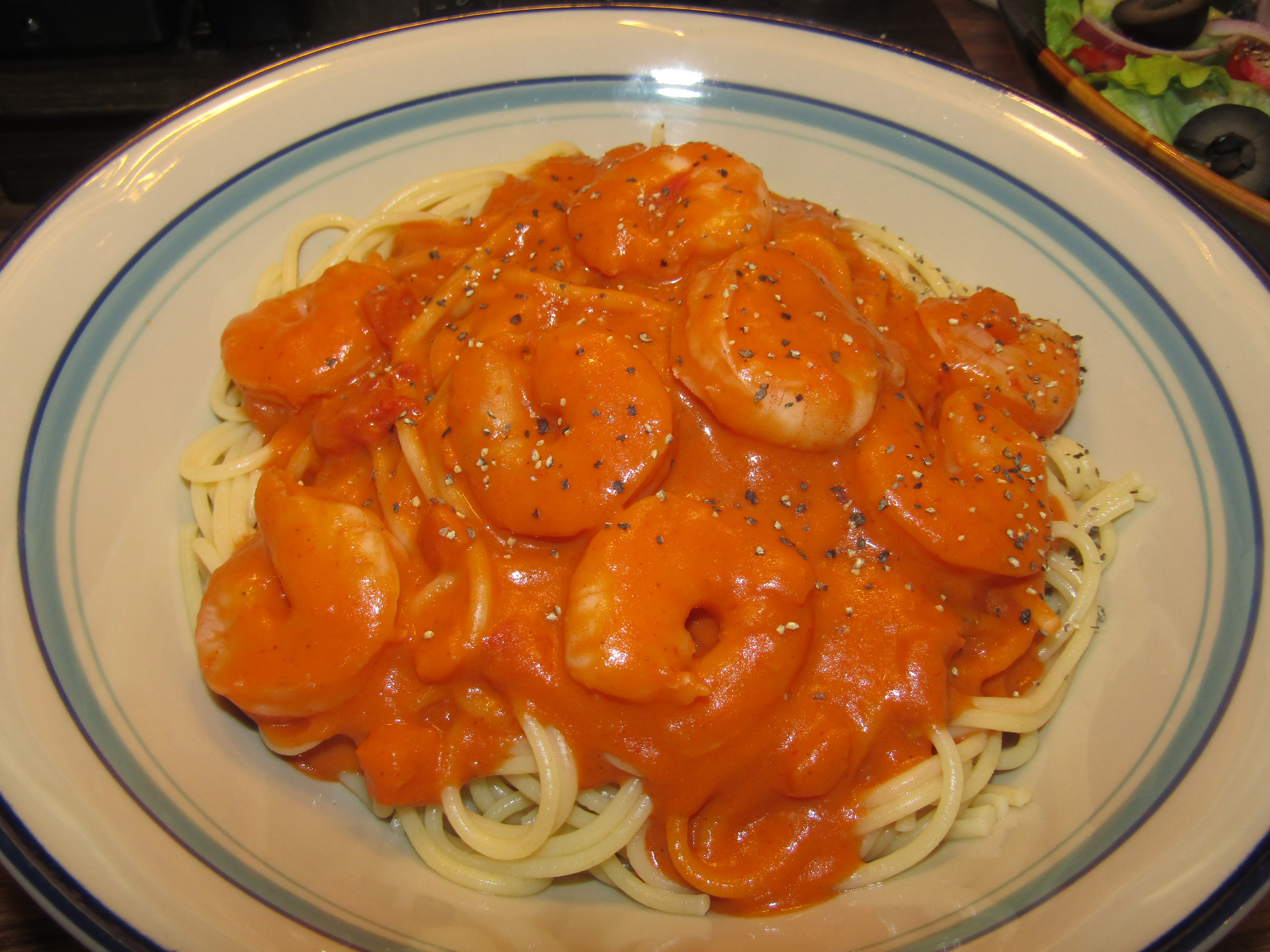 Shrimp in Vodka Sauce over spaghetti 2-15-23.JPG