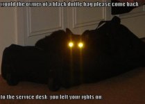 funny-pictures-the-owner-of-the-black-duffel-bag-left-his-lights-on.jpg