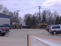 Dike being built, behind Northwest Tire.jpg