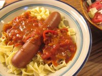 Dopg in Creole' Sauce over Noodles.jpg