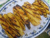 Grilled pineapple spears with ancho chili powder.JPG